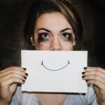 Two people talking supportively during an addiction recovery session